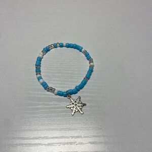 Blue Beaded Bracelet with Snowflake Charm